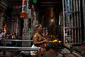 Worship and puja offerings inside the Swamimalai temple. 